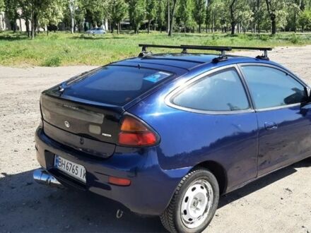 Синий Мазда 323, объемом двигателя 1.5 л и пробегом 3 тыс. км за 700 $, фото 1 на Automoto.ua