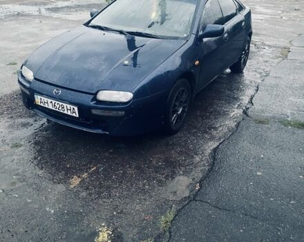 Синий Мазда 323, объемом двигателя 1.5 л и пробегом 350 тыс. км за 1350 $, фото 1 на Automoto.ua