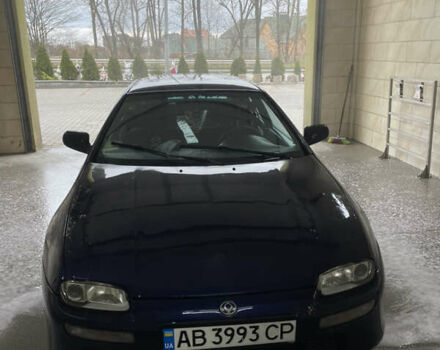 Синий Мазда 323, объемом двигателя 1.49 л и пробегом 329 тыс. км за 1500 $, фото 1 на Automoto.ua