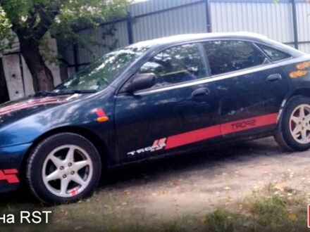 Синій Мазда 323, об'ємом двигуна 1.5 л та пробігом 454 тис. км за 1350 $, фото 1 на Automoto.ua