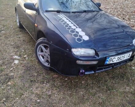 Синій Мазда 323, об'ємом двигуна 1.5 л та пробігом 300 тис. км за 1700 $, фото 1 на Automoto.ua