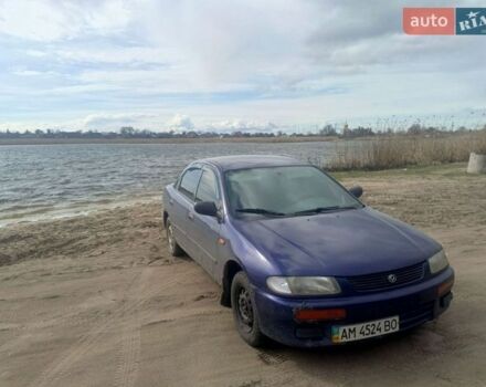 Синий Мазда 323, объемом двигателя 1.5 л и пробегом 680 тыс. км за 1100 $, фото 1 на Automoto.ua