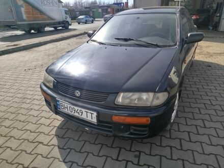 Синий Мазда 323, объемом двигателя 1.3 л и пробегом 287 тыс. км за 1700 $, фото 1 на Automoto.ua