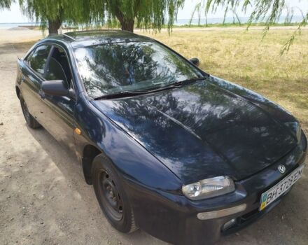 Синій Мазда 323, об'ємом двигуна 1.5 л та пробігом 359 тис. км за 3500 $, фото 1 на Automoto.ua