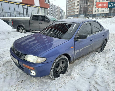 Синий Мазда 323, объемом двигателя 1.49 л и пробегом 250 тыс. км за 1000 $, фото 1 на Automoto.ua