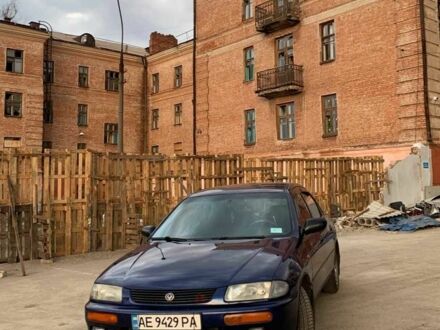 Синий Мазда 323, объемом двигателя 1.5 л и пробегом 419 тыс. км за 2500 $, фото 1 на Automoto.ua