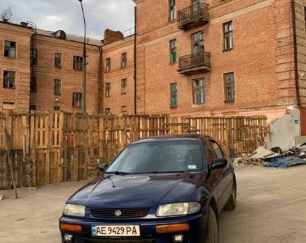 Синий Мазда 323, объемом двигателя 1.5 л и пробегом 419 тыс. км за 2500 $, фото 1 на Automoto.ua