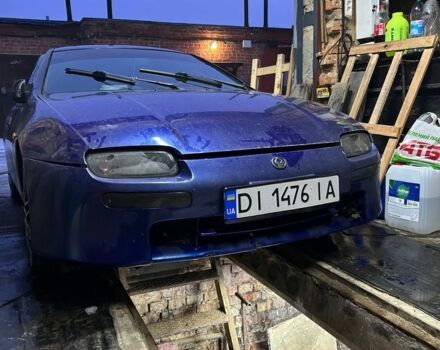 Синій Мазда 323, об'ємом двигуна 1.5 л та пробігом 350 тис. км за 671 $, фото 1 на Automoto.ua