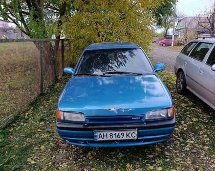 Синій Мазда 323, об'ємом двигуна 1.69 л та пробігом 250 тис. км за 750 $, фото 1 на Automoto.ua