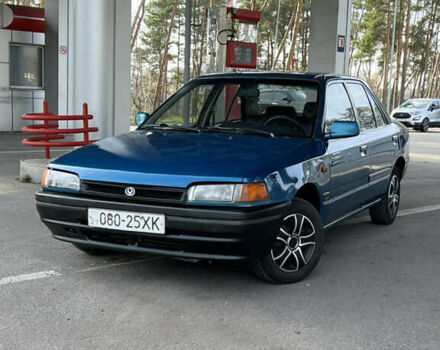 Синий Мазда 323, объемом двигателя 1.6 л и пробегом 250 тыс. км за 1900 $, фото 1 на Automoto.ua