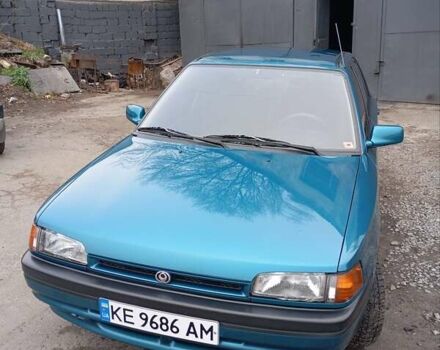 Синий Мазда 323, объемом двигателя 1.6 л и пробегом 159 тыс. км за 3000 $, фото 1 на Automoto.ua