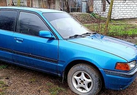 Синий Мазда 323, объемом двигателя 1.6 л и пробегом 425 тыс. км за 1500 $, фото 1 на Automoto.ua