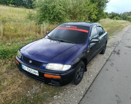 Синій Мазда 323, об'ємом двигуна 0 л та пробігом 200 тис. км за 850 $, фото 1 на Automoto.ua