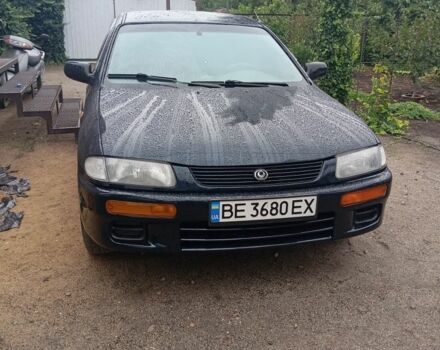 Синий Мазда 323, объемом двигателя 1.3 л и пробегом 300 тыс. км за 2198 $, фото 1 на Automoto.ua