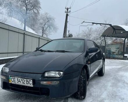Синій Мазда 323, об'ємом двигуна 1.8 л та пробігом 300 тис. км за 2200 $, фото 1 на Automoto.ua