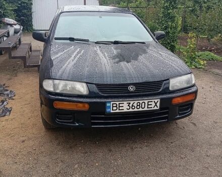 Синій Мазда 323, об'ємом двигуна 1.3 л та пробігом 300 тис. км за 2198 $, фото 1 на Automoto.ua
