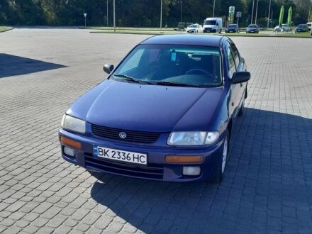 Синий Мазда 323, объемом двигателя 1.5 л и пробегом 290 тыс. км за 1999 $, фото 1 на Automoto.ua