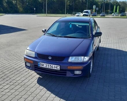 Синий Мазда 323, объемом двигателя 1.5 л и пробегом 290 тыс. км за 1999 $, фото 1 на Automoto.ua