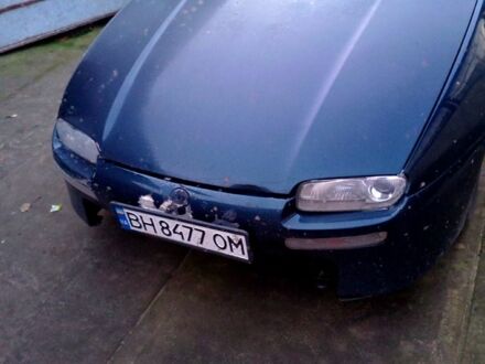 Синій Мазда 323, об'ємом двигуна 1.5 л та пробігом 235 тис. км за 1600 $, фото 1 на Automoto.ua