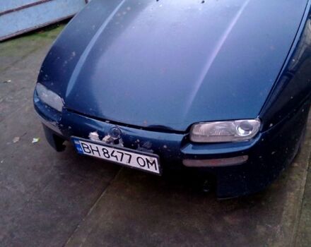 Синий Мазда 323, объемом двигателя 1.5 л и пробегом 235 тыс. км за 1600 $, фото 1 на Automoto.ua