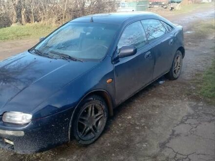 Синий Мазда 323, объемом двигателя 1.49 л и пробегом 521 тыс. км за 1400 $, фото 1 на Automoto.ua