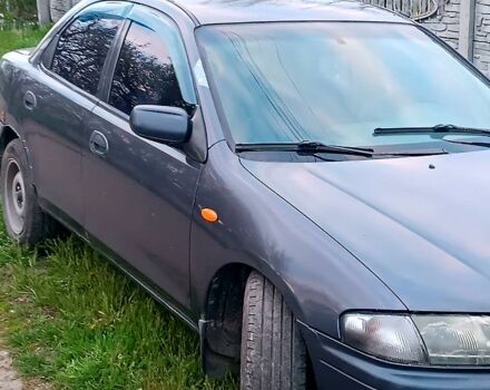 Синий Мазда 323, объемом двигателя 1.8 л и пробегом 0 тыс. км за 1600 $, фото 1 на Automoto.ua