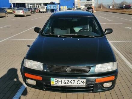 Синий Мазда 323, объемом двигателя 1.49 л и пробегом 100 тыс. км за 2650 $, фото 1 на Automoto.ua