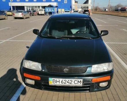 Синій Мазда 323, об'ємом двигуна 1.49 л та пробігом 100 тис. км за 2650 $, фото 1 на Automoto.ua