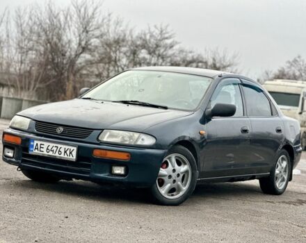 Синий Мазда 323, объемом двигателя 1.5 л и пробегом 399 тыс. км за 1550 $, фото 1 на Automoto.ua