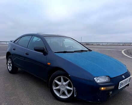 Синій Мазда 323, об'ємом двигуна 1.5 л та пробігом 296 тис. км за 1800 $, фото 1 на Automoto.ua