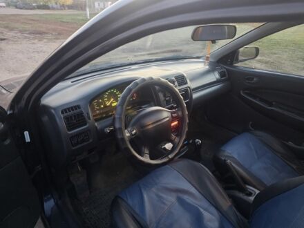 Мазда 323 1996 в Покровском на Automoto.ua Синий Мазда 323, объемом двигателя 1.5 л и пробегом 400 тыс. км за 2054 $, фото 1 на Automoto.ua
