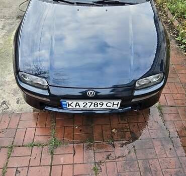 Синий Мазда 323, объемом двигателя 1.5 л и пробегом 237 тыс. км за 2200 $, фото 1 на Automoto.ua