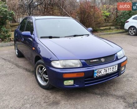 Синий Мазда 323, объемом двигателя 1.5 л и пробегом 342 тыс. км за 2600 $, фото 1 на Automoto.ua