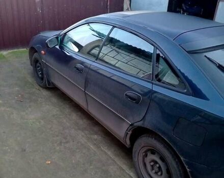 Синий Мазда 323, объемом двигателя 1.5 л и пробегом 235 тыс. км за 1600 $, фото 1 на Automoto.ua