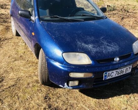 Синій Мазда 323, об'ємом двигуна 1.5 л та пробігом 258 тис. км за 1250 $, фото 1 на Automoto.ua