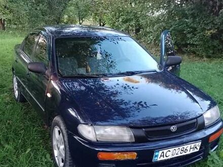 Синій Мазда 323, об'ємом двигуна 1.5 л та пробігом 400 тис. км за 1650 $, фото 1 на Automoto.ua