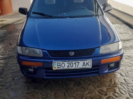 Синий Мазда 323, объемом двигателя 1.5 л и пробегом 466 тыс. км за 1600 $, фото 1 на Automoto.ua