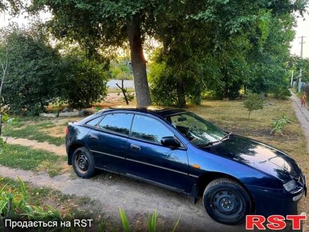Синій Мазда 323, об'ємом двигуна 1.5 л та пробігом 348 тис. км за 2000 $, фото 1 на Automoto.ua
