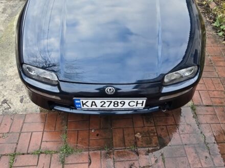 Синій Мазда 323, об'ємом двигуна 1.5 л та пробігом 237 тис. км за 1800 $, фото 1 на Automoto.ua