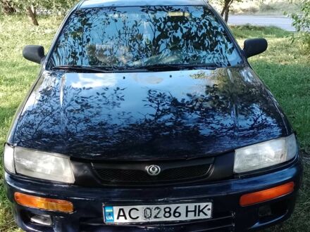 Синій Мазда 323, об'ємом двигуна 1.5 л та пробігом 400 тис. км за 1650 $, фото 1 на Automoto.ua
