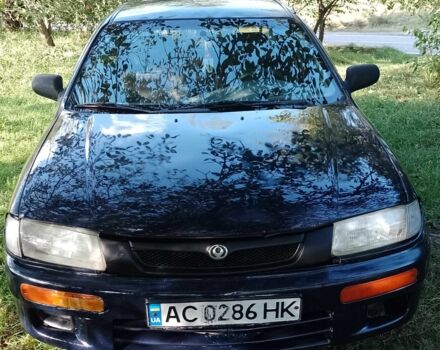 Синий Мазда 323, объемом двигателя 1.5 л и пробегом 400 тыс. км за 1650 $, фото 1 на Automoto.ua