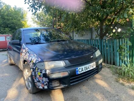 Синий Мазда 323, объемом двигателя 0 л и пробегом 200 тыс. км за 1301 $, фото 1 на Automoto.ua