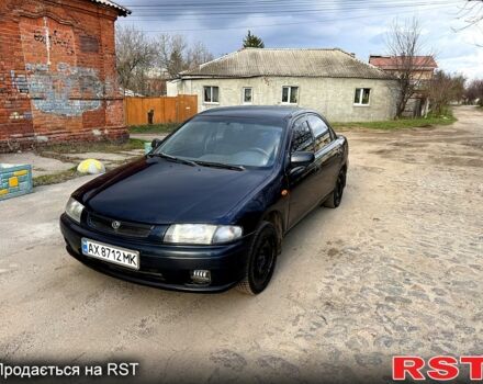 Синий Мазда 323, объемом двигателя 1.5 л и пробегом 200 тыс. км за 1750 $, фото 1 на Automoto.ua