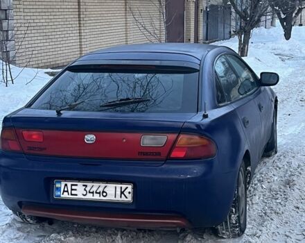 Синий Мазда 323, объемом двигателя 1.5 л и пробегом 3 тыс. км за 700 $, фото 1 на Automoto.ua