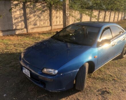 Синий Мазда 323, объемом двигателя 1.5 л и пробегом 388 тыс. км за 1700 $, фото 1 на Automoto.ua