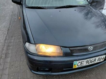 Синій Мазда 323, об'ємом двигуна 1.5 л та пробігом 363 тис. км за 2300 $, фото 1 на Automoto.ua