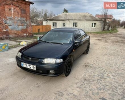 Синий Мазда 323, объемом двигателя 1.5 л и пробегом 200 тыс. км за 1750 $, фото 1 на Automoto.ua
