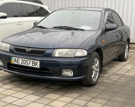 Синий Мазда 323, объемом двигателя 1.5 л и пробегом 230 тыс. км за 4602 $, фото 1 на Automoto.ua