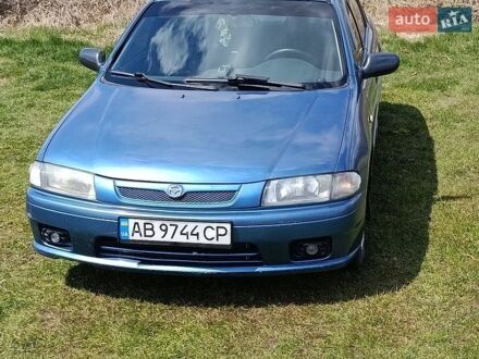 Синий Мазда 323, объемом двигателя 1.5 л и пробегом 312 тыс. км за 2200 $, фото 1 на Automoto.ua