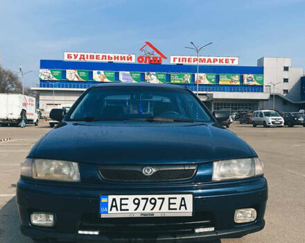 Синий Мазда 323, объемом двигателя 1.5 л и пробегом 320 тыс. км за 3200 $, фото 1 на Automoto.ua